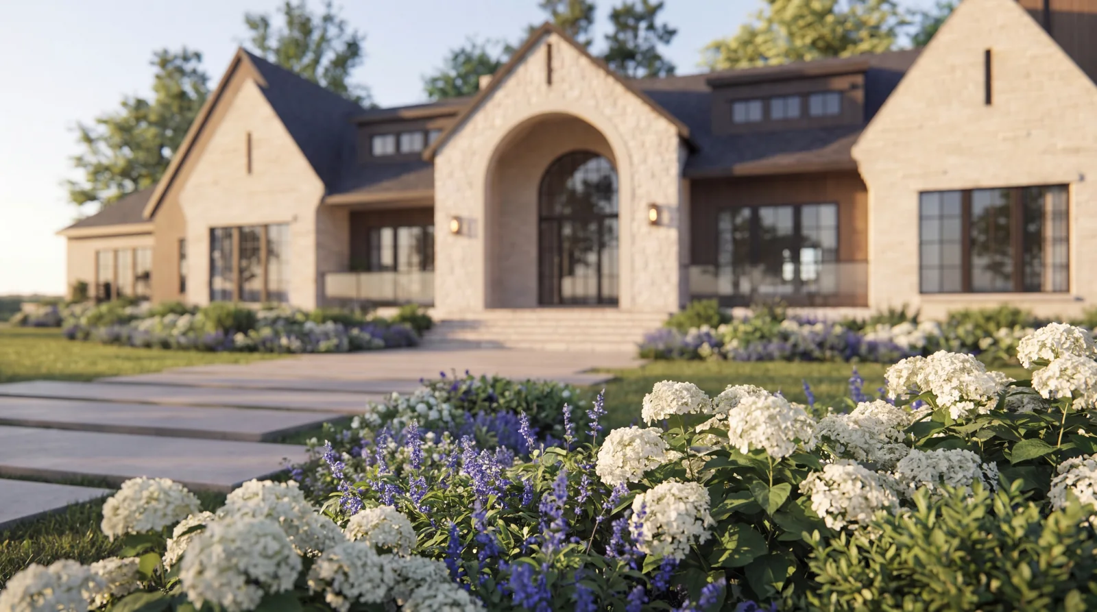 White flowers and layered planting at the front of the home